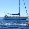  In the deep end ... (from far left) the swimmers bob in the Aegean Sea; the group swims beside the yacht Katerina