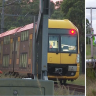 Teen charged after passenger train hits trailer in Sydney
