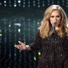 Adele joins Grenfell Tower survivors for one-year anniversary