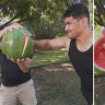 Alex Leapai Jr punches a hole through a watermelon as a homage to his famous father.