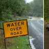 Queensland floods turn fatal after woman swept away in car