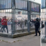 Police tear gas Champions League fans