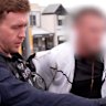 NSW Police vision shows a search in Menai and the arrest of a 21-year-old man in Narellan.