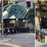 Queensland police made four arrests as white nationalists marched through the Brisbane CBD. Warning: Video contains coarse language.