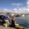 Kids ishing on the main wharf at Port Lincoln with the Maria Luisa, a tuna boat nearby