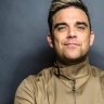 Playful Robbie Williams swings both ways at Perth show