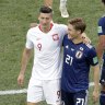 Japan survive despite loss to Poland
