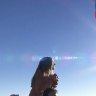 David Blaine successfully flies over the Arizona desert holding onto helium balloons