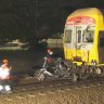 Driver escapes before train cripples car on Central Coast