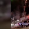 Footage shows ute with fireworks flaring as passengers wave Palestinian flag