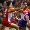 Competition watchdog muscles AFL over hidden charges for fans