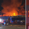 Major Sydney factory fire continues to burn, with multiple roads closed.