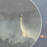Perth Hills is on high alert as a fire burns out of control, threatening homes surrounded by bushland.