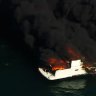 Two men rescued from flaming boat on Port Phillip Bay