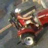 A Queensland man has been filmed attempting to steal a helicopter in a red tractor before fleeing the scene.