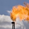 BHP Billiton weighs US oil cuts, write-downs