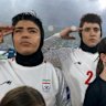 Iran's players were silent before their first match, but saluted the national anthem ahead of the second game against Australia.