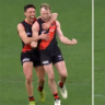 Nick Hind's running snap kills off Sydney's hopes and seals Essendon's win.