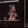 Adele reacts mid-concert to Australian breakdancer Raygun