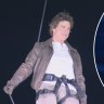 Tom Cruise flies into closing ceremony