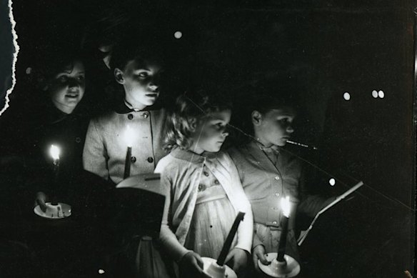 Carols by Candlelight spectators at the Myer Music Bowl in years gone by.