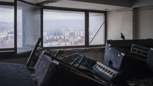 A pigeon takes in the view from a room on the Grand Hotel's 12th floor.