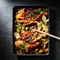 Sticky pomegranate and cous cous chicken tray bake.