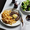 Steak frites with umami butter.