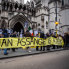 Supports of Julian Assange gather outside the High Court in London.