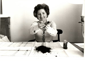 Millie Phillips, director and chair of the International Mining Company, with Mount Coolon oil shale, 1980.