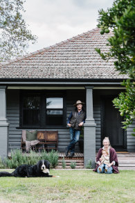 Angus and Bec Macdougall with their daughter, Emme, on their farm.