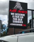 A sign outside the CFMEU headquarters at Bowen Hills depicting Cross River Rail Minister Kate Jones.
