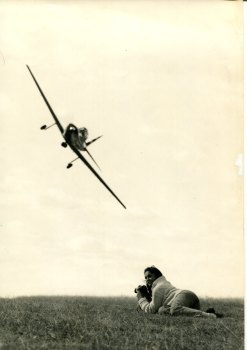 Keith Fitton flying a Chipmunk with Phoebe Macarthur-Onslow on the  ground during a photo shoot for the Sydney Air Show.