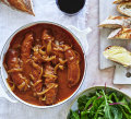 Sausage sizzle meets stew in this one-pot recipe.