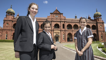 Santa Sabina College students Matilda Ball, Grace Campbell and Sophie Graham sport the new uniforms.