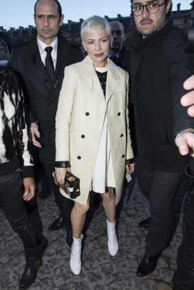 Actress Michelle Williams arrives at the Louis Vuitton show at Paris Fashion Week.