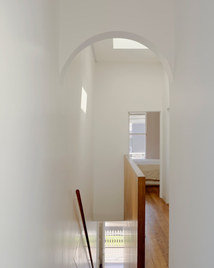 The original staircase, which once required a series of manoeuvres, was replaced with recycled timber steps that followed a straight line.