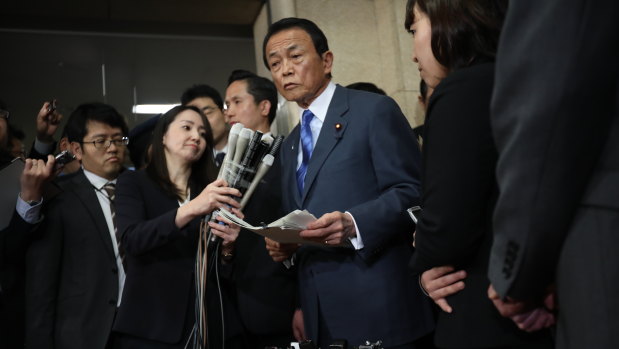 Taro Aso, Japan's finance minister has refused to step down after it was revealed that his name and that of Prime Minister Shinzo Abe were removed from documents connected with a land-sale scandal. 