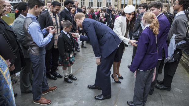 Prince Harry and Meghan Markle meet well-wishers at Westminster Abbey on Monday.