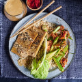 Satay tempeh rice bowls with crunchy kimchi cucumbers. 