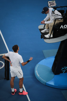 Roger Federer discusses a call with an umpire at the 2018 Australian Open.