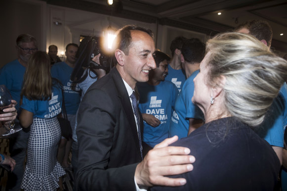 Dave Sharma greets supporters after conceding defeat in the by-election.