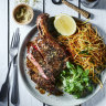 Coffee-rubbed rib-eye with straw fries.