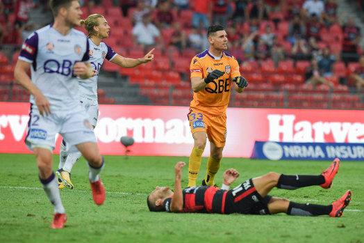 The moment: Liam Reddy reacts while Jaushua Sotirio lays sprawled on the ground.