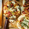 Caramelised cabbage and pancetta pizzas.