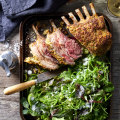 Mint-crusted lamb rack with olive and chilli salad.