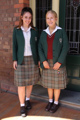 Brielle Messina and Arielle Harrison of Santa Sabina College in their kilts.