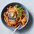 20-minute crispy barramundi with chilli and tomato butter pasta.