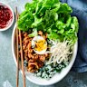 Korean beef and green rice bowl with soft-boiled eggs.