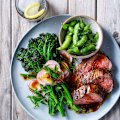 Soy-marinated steak with broccolini and edamame salad.